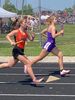 Ellie Cawyer making strides on an opponent at the sectional track meet.
