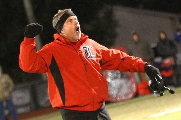 Photo courtesy of Terry Redman
Lamar football coach Scott Bailey tries to pump up the crowd as he throws his fist into the air and yells, “4th quarter”… “4th quarter”… “4th quarter”...