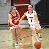 Photo by Terry Redman
Lady Bulldogs defeat Lady Tigers, 49-37
Lamar Lady Tiger No. 1 Jaxsyn Lovan brings the ball up court in action vs Liberal. The Bulldogs No. 5 Sadie Meadows defends on the play.