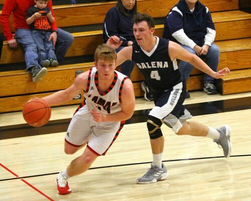 Lamar sophomore No. 34 Case Tucker drives the baseline in varsity basketball action at LHS. The Tigers defeated the Galena Bulldogs 60-45.