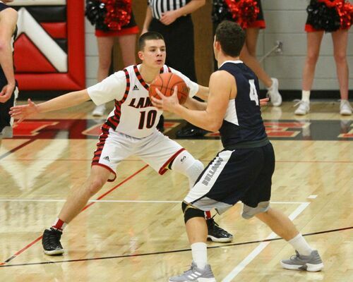 Lamar senior Jonny Jeffries defends against this Galena player in action at LHS.