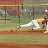 Lamar Democrat/Chris Morrow
Lockwood pitcher Dylan Snider attempts to pick off a St. Elizabeth baserunner, who slipped in under first baseman Spencer Neal's tag on a very close play.