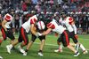 Photo courtesy of Terry Redman
The McDonald County quarterback was continually running for his life as the Tiger defense with No. 49 Khiler Nance and No. 69 Rourke Dillon, with help from No. 54 Xavier Pagacz and No. 9 Cameron Sturgell combine to get a sack.