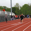 Photo by Terry Redman
Former Lamar standout athlete Luke Hardman (in all black) blazed down the track to win the 100 meter dash in the men's open division.