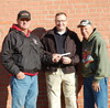 Lamar Democrat/Melody Metzger
Lamar Cruise Night recently donated a check in the amount of $250 to be used for the Shop With a Hero program (currently Shop With a Cop). Pictured are, left to right, Gordie Godfrey, Lamar Police Chief Joe Moore and Bill Nixon.