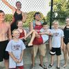 Seven members of the TigerSharks swim team traveled to Ft. Scott, Kan. for a dual meet on July 22. Pictured, left to right, are, front row, Graham Davis; middle row, Jacob Morrison, Sadie Bull, Coach Koleton Mahurin, Vance Bull, Elijah Morrison and Meghan Watson and back row, Kinslee Keatts.