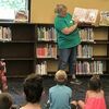 Lamar Democrat/Autumn Shelton
Children's Librarian Heidi Lanz reads a story to summer reading program attendees.